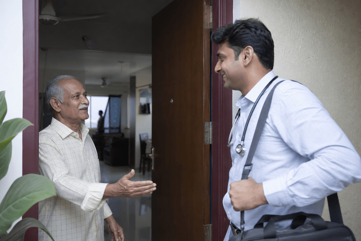Verified Indian doctor with medical bag arriving for a home visit in Hyderabad